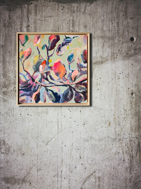 Original Magnolia painting in a natural wooden frame on a concrete wall